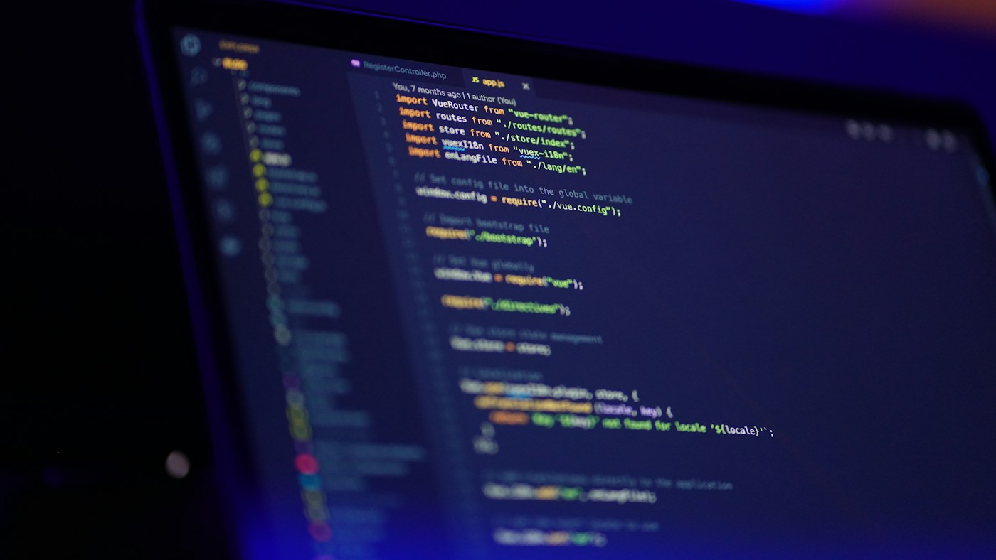 Source code displayed on a laptop screen